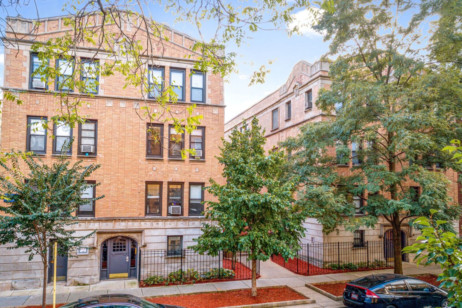 A three-story tan brick apartment building at 815 West Cornelia Avenue in Chicago’s Lakeview neig...