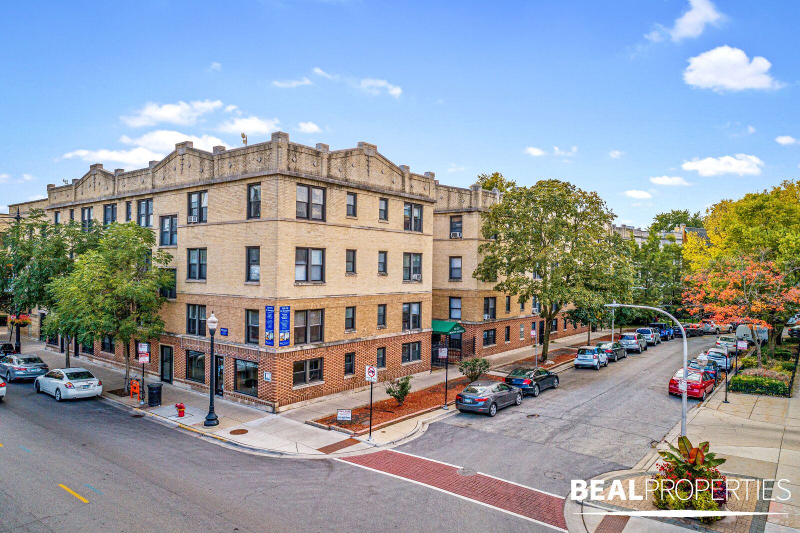 Oblique street-level view of the apartment building at 701–15 West Brompton in Wrigleyville. The ...