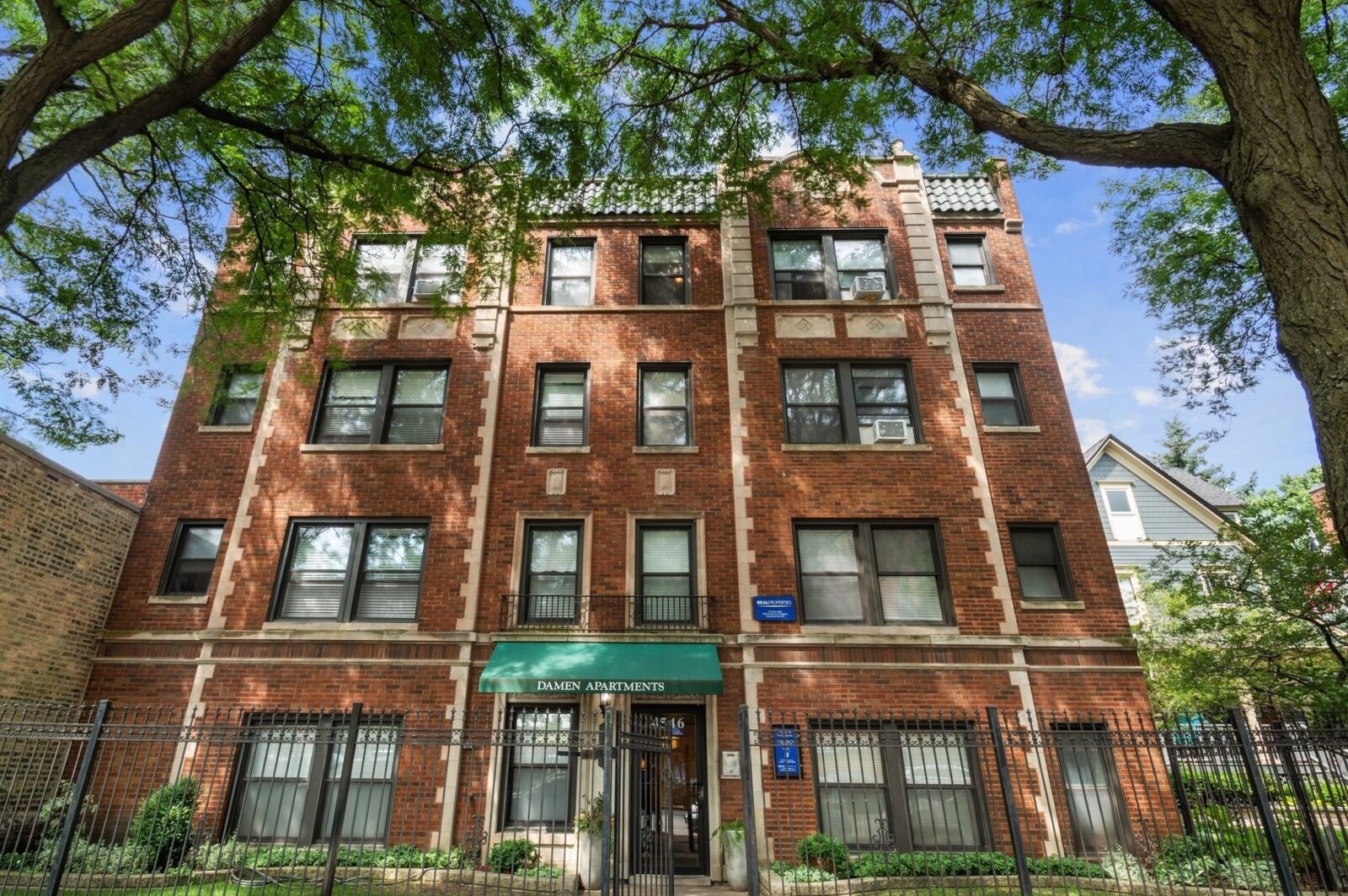 A red brick apartment building at 4546 North Damen Avenue in Chicago’s Ravenswood neighborhood, w...